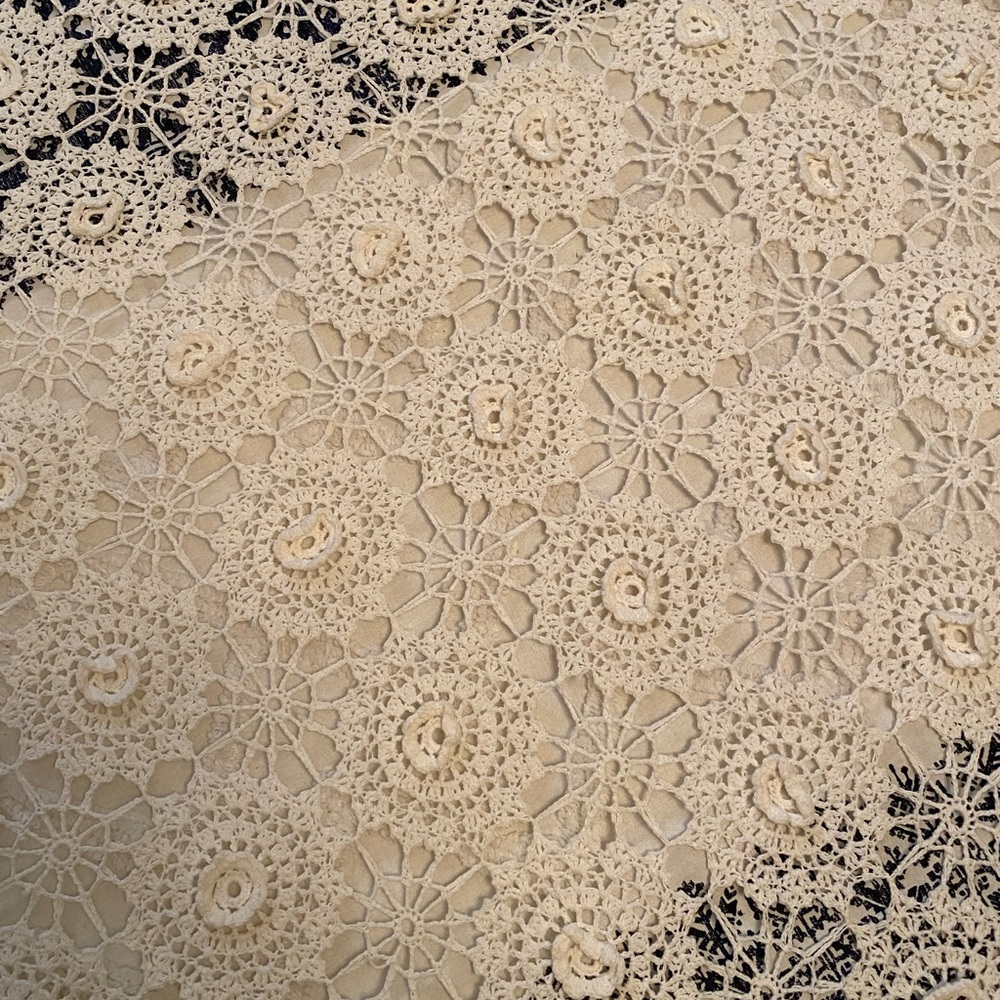 White cotton crochet coverlet